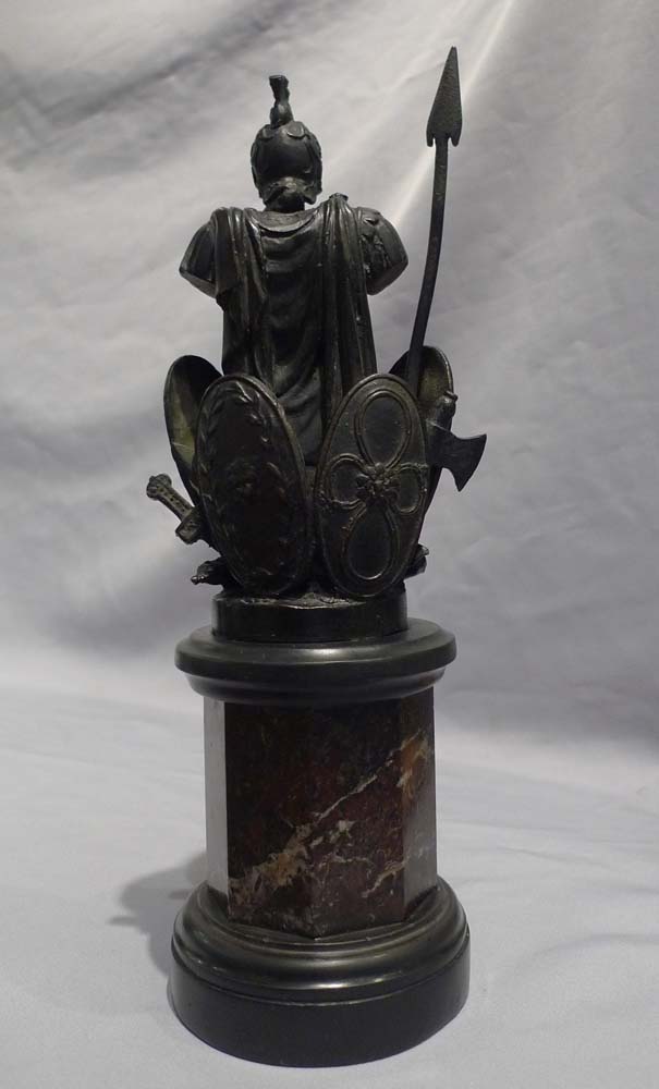 Pair antique grand tour bronze trophies of war on black marble and shaped variagated marble stems.