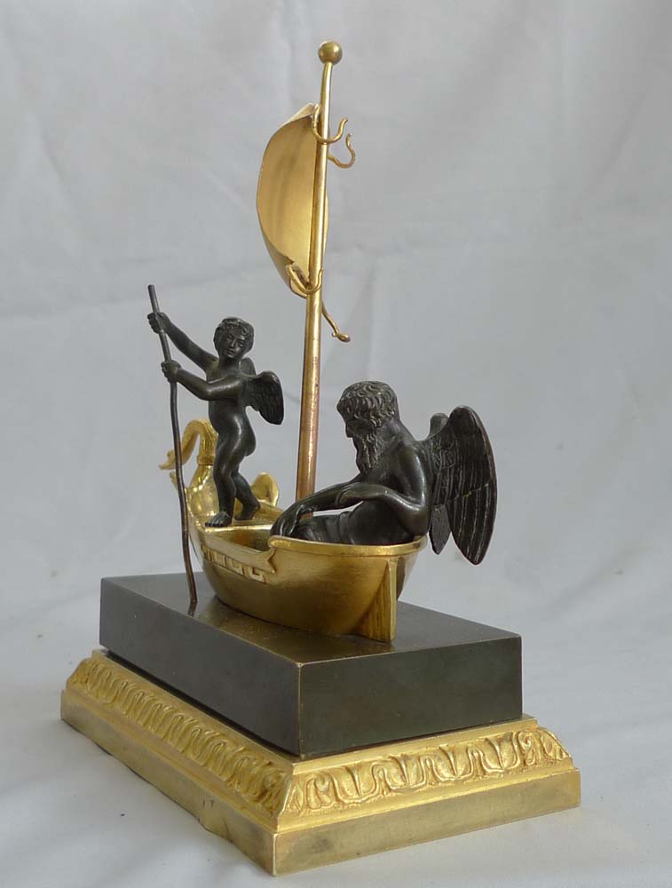 French antique inkwell or ecrier and watchstand with figure of Chronos and Cupid crossing the Styx.