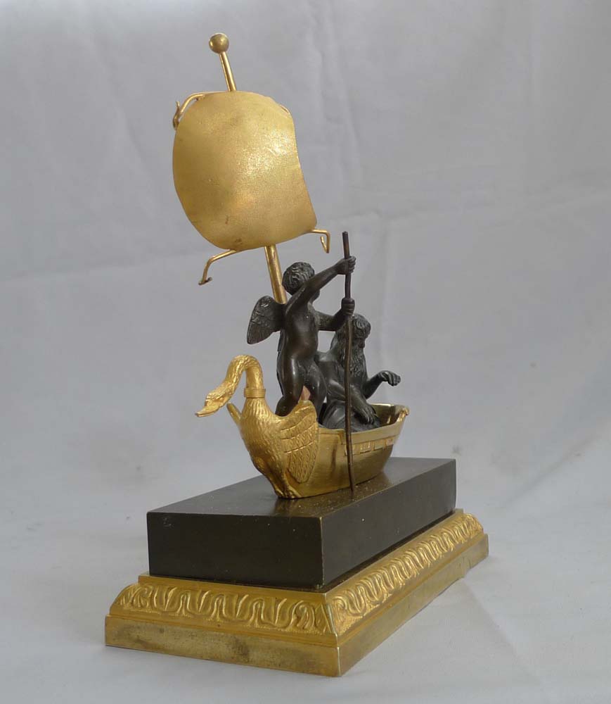 French antique inkwell or ecrier and watchstand with figure of Chronos and Cupid crossing the Styx.