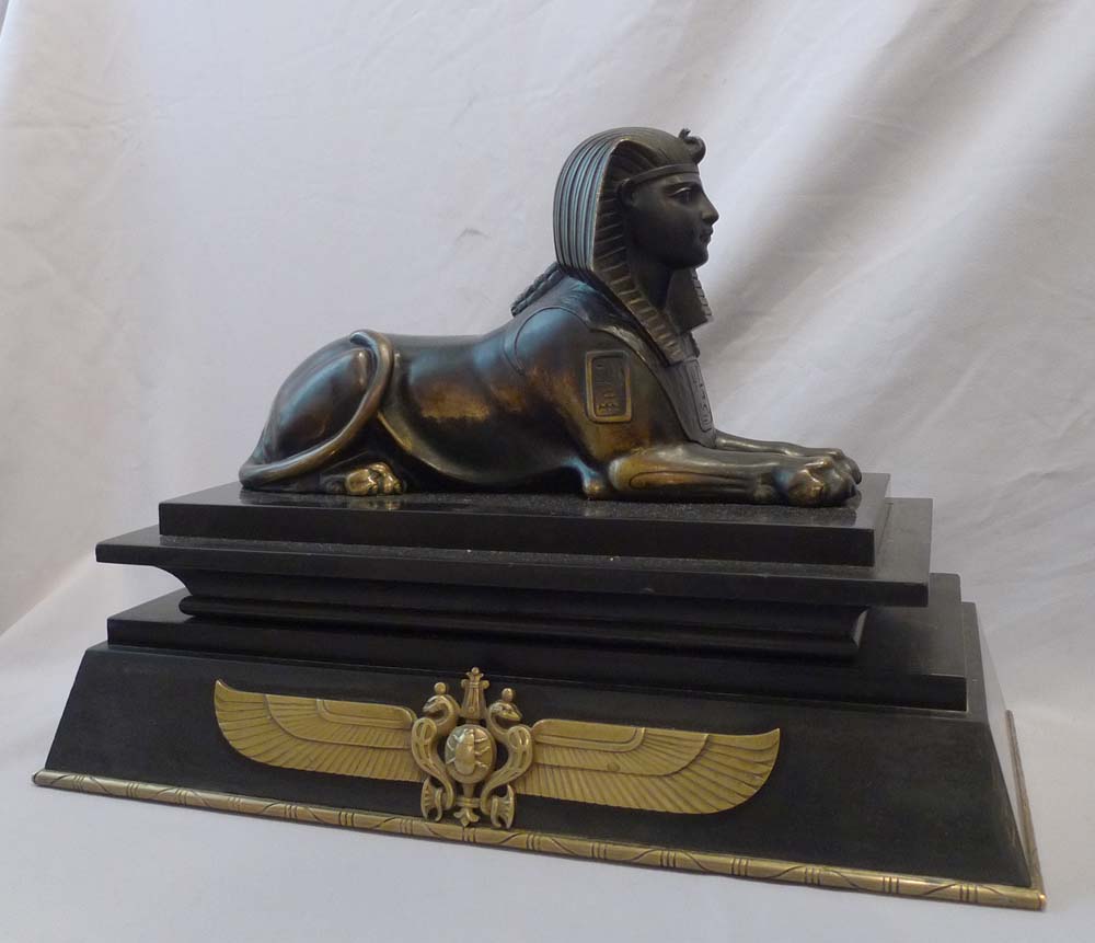 Antique Egyptian revival bronze of the Sphinx on bronze mounted black marble