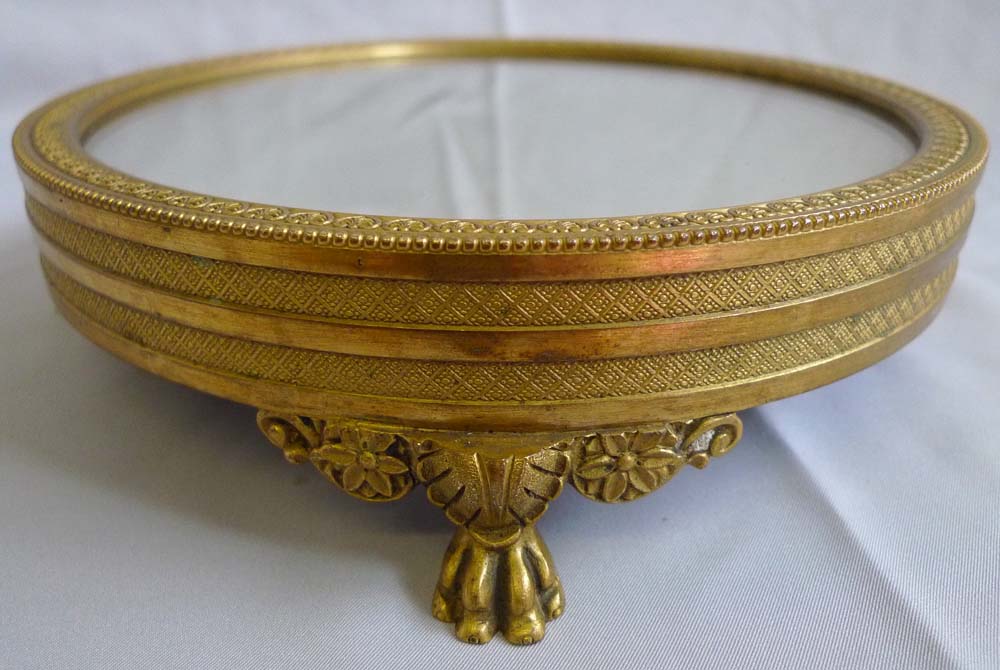 Antique mirrored and gilt bronze table stand in Empire style