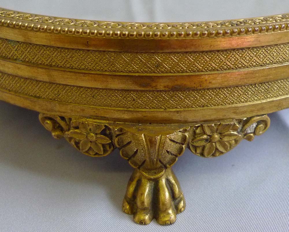 Antique mirrored and gilt bronze table stand in Empire style