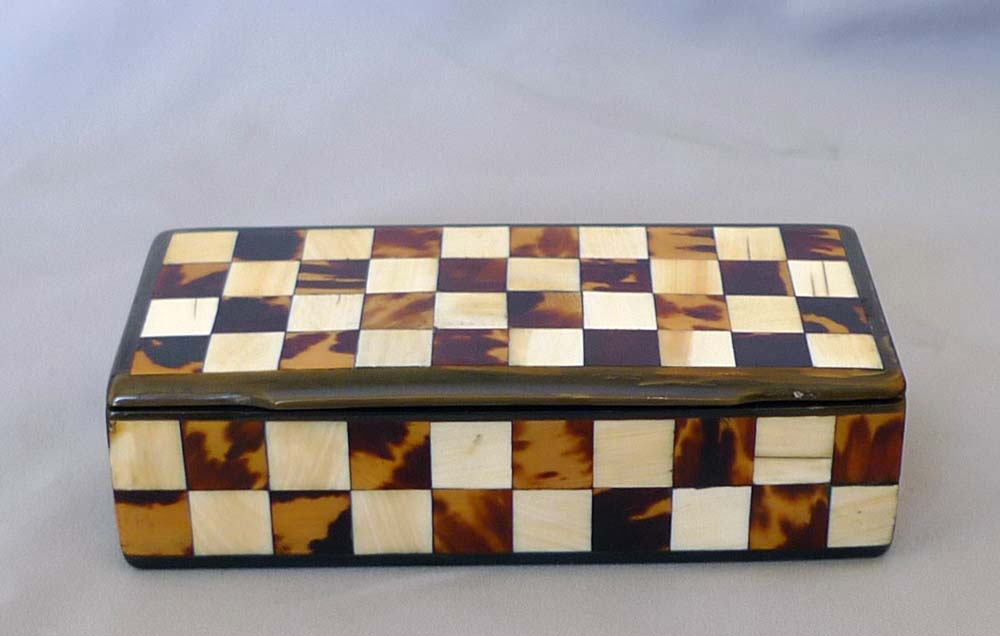 Antique harlequin box in horn, tortoiseshell and ivory box.