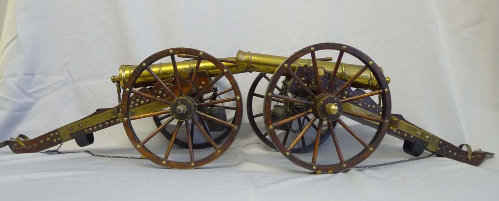 Pair of mahogany and bronze field cannon.