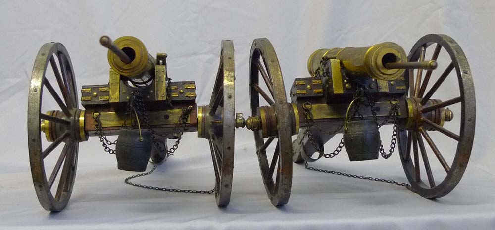 Pair of mahogany and bronze field cannon.
