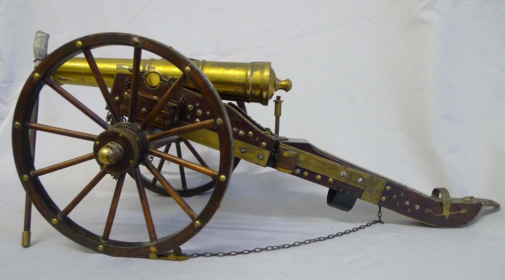 Pair of mahogany and bronze field cannon.
