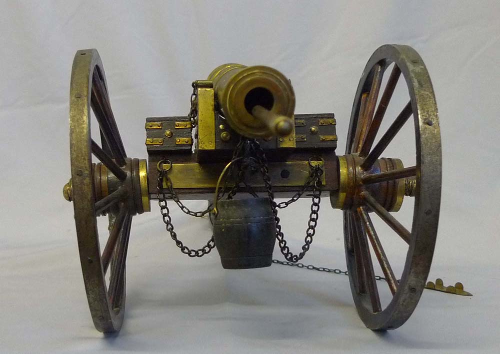 Pair of mahogany and bronze field cannon.
