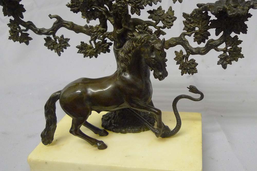 Antique English Regency candelabra of Stallion rearing at a snale on white marble base.
