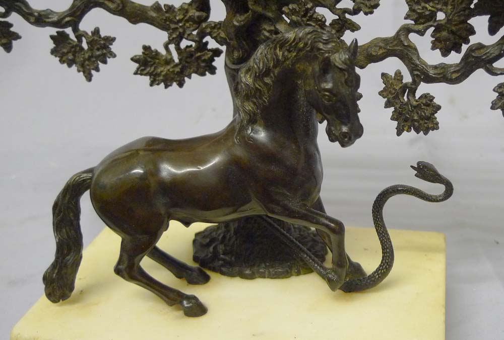 Antique English Regency candelabra of Stallion rearing at a snale on white marble base.