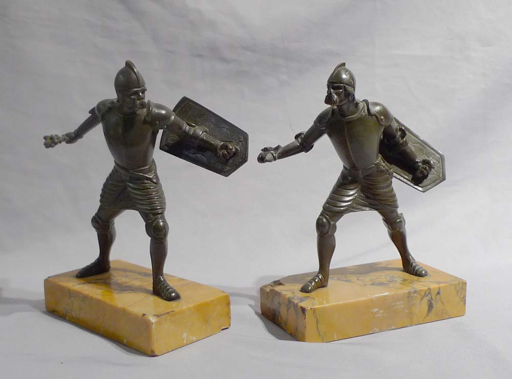 Grand Tour bronzes of warriors on Sienna marble bases.