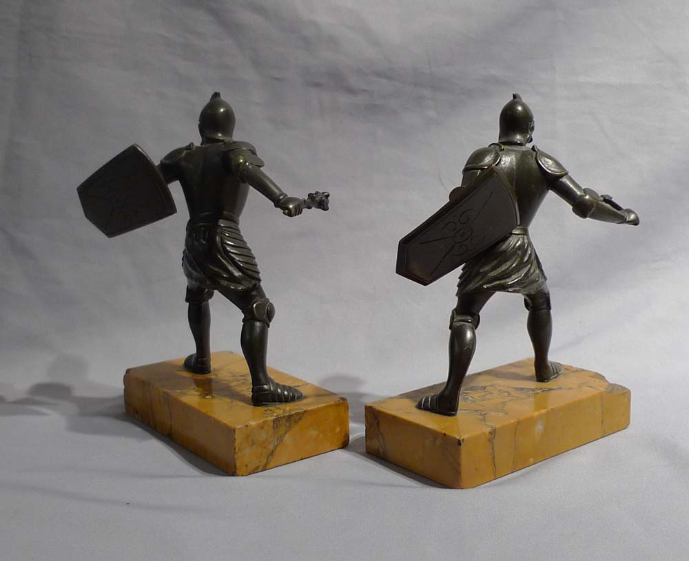 Grand Tour bronzes of warriors on Sienna marble bases.