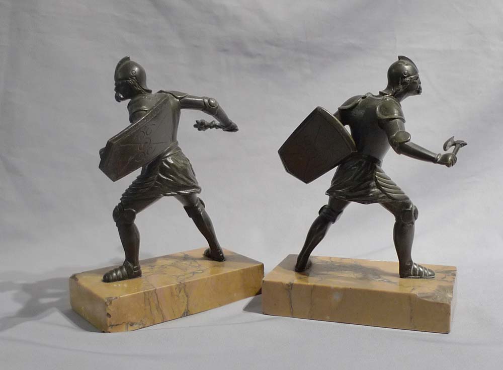Grand Tour bronzes of warriors on Sienna marble bases.