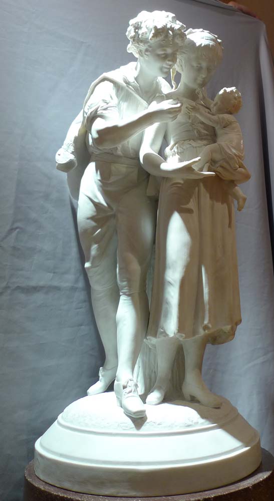 Antique French bisque porcelain group of young family..