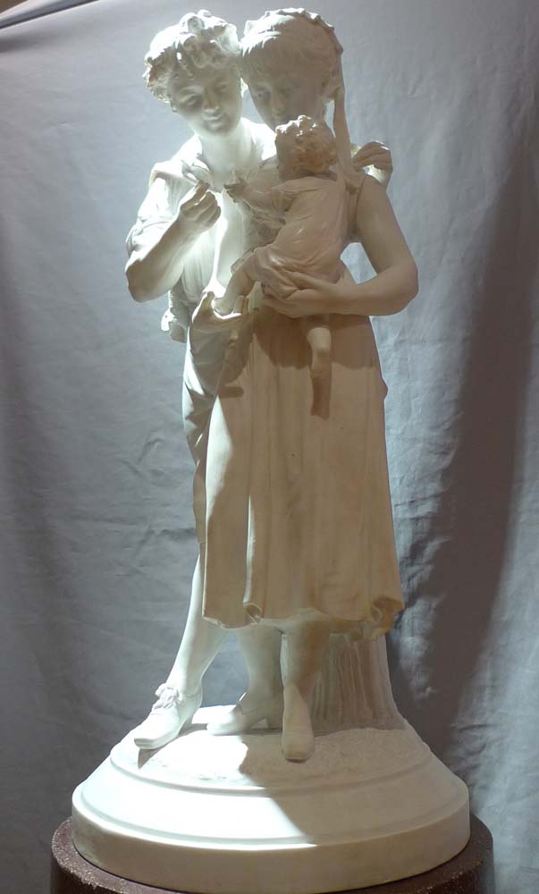 Antique French bisque porcelain group of young family..