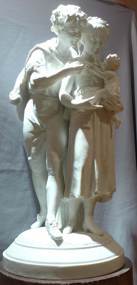 Antique French bisque porcelain group of young family..