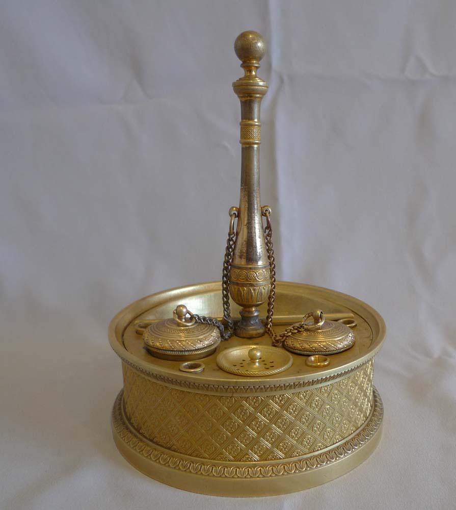 A French Empire ormolu inkwell.