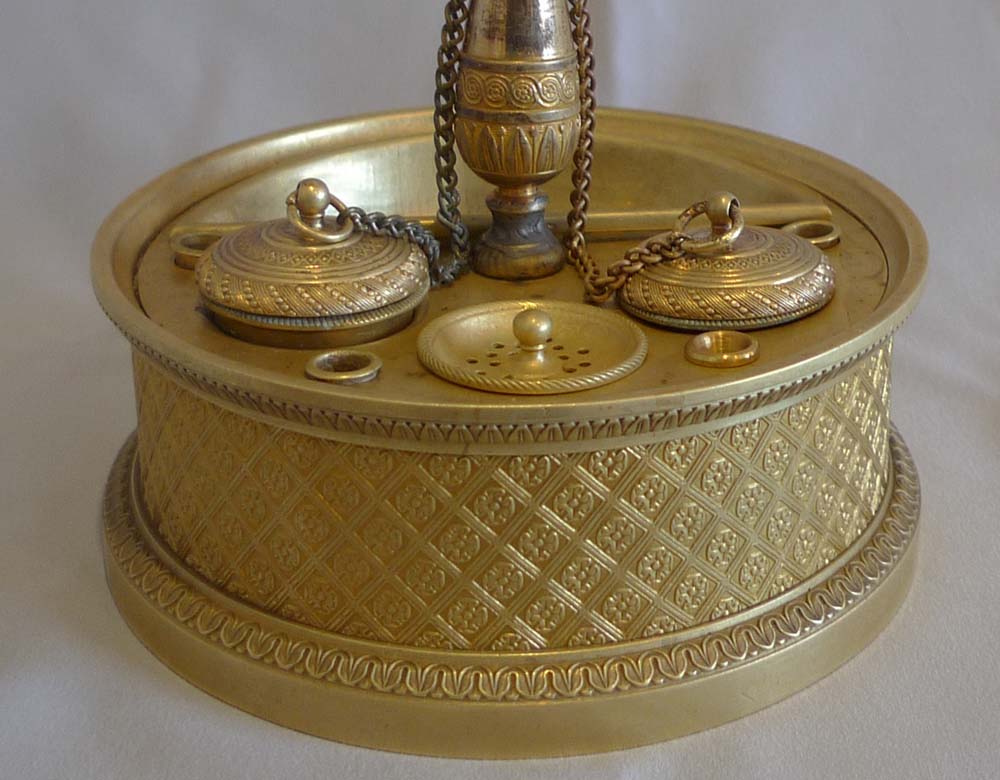A French Empire ormolu inkwell.