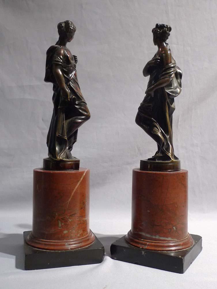 Pair Italian classical female bronzes on marble bases.