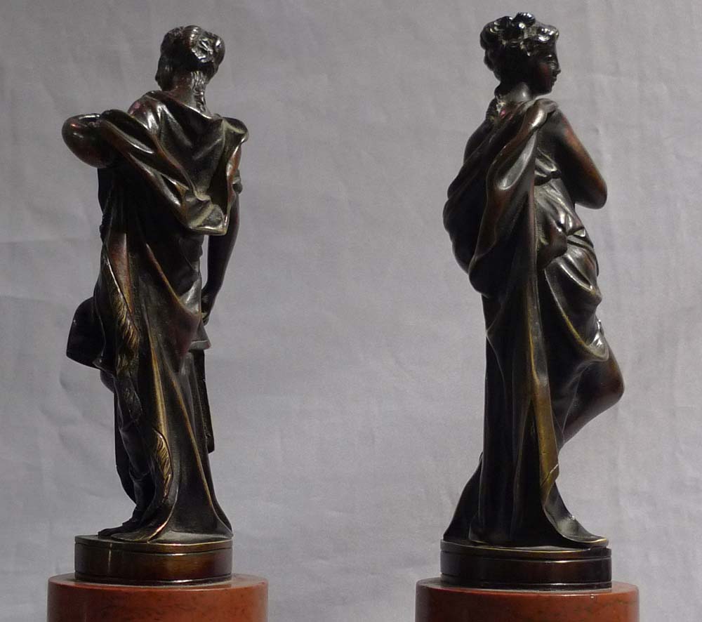 Pair Italian classical female bronzes on marble bases.