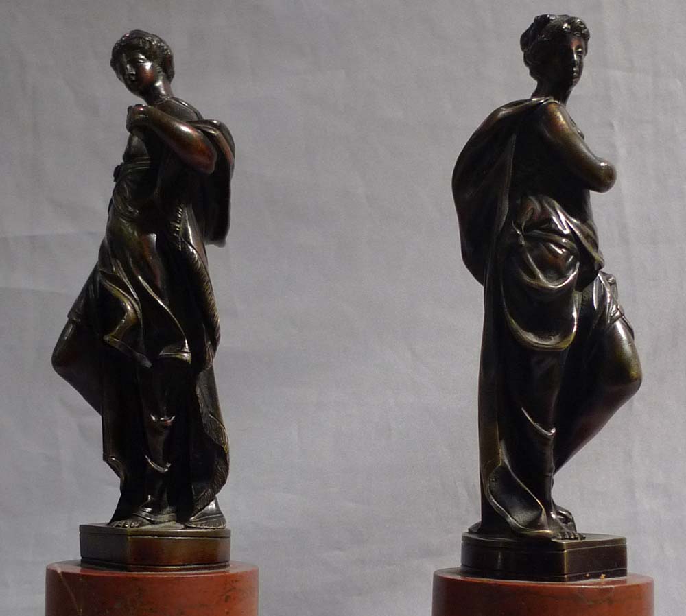 Pair Italian classical female bronzes on marble bases.