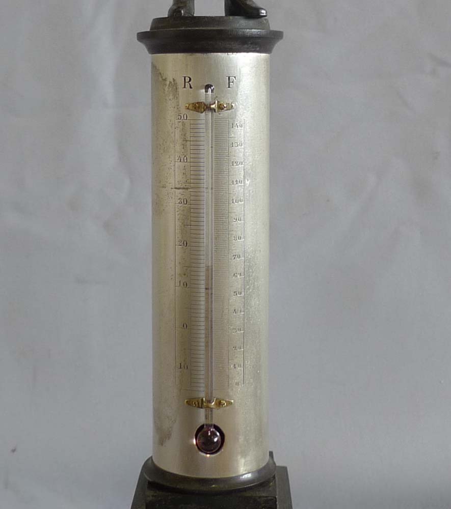 Antique French bronze of Napoleon standing on a column incorporating a thermometer.