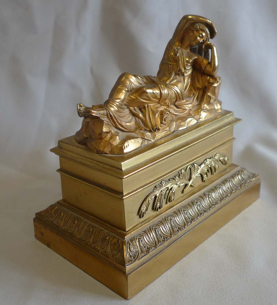 Antique French gilt bronze inkwell and sander with classical figure to the lid.