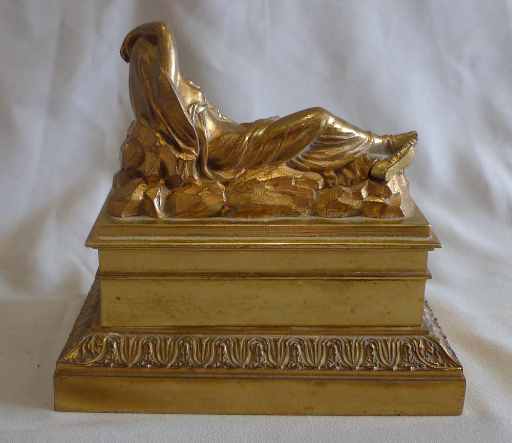 Antique French gilt bronze inkwell and sander with classical figure to the lid.