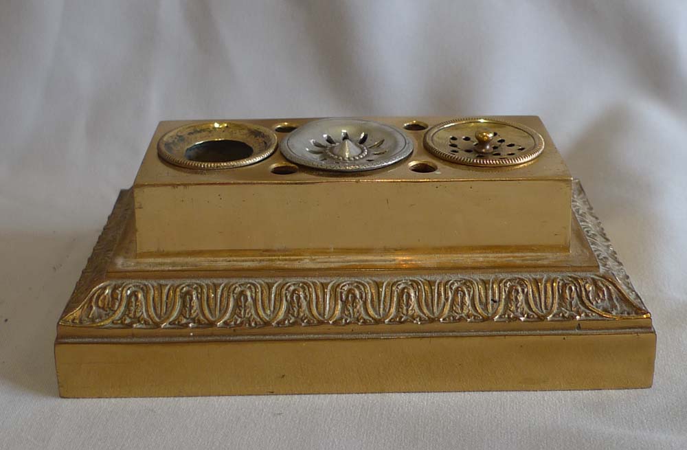Antique French gilt bronze inkwell and sander with classical figure to the lid.