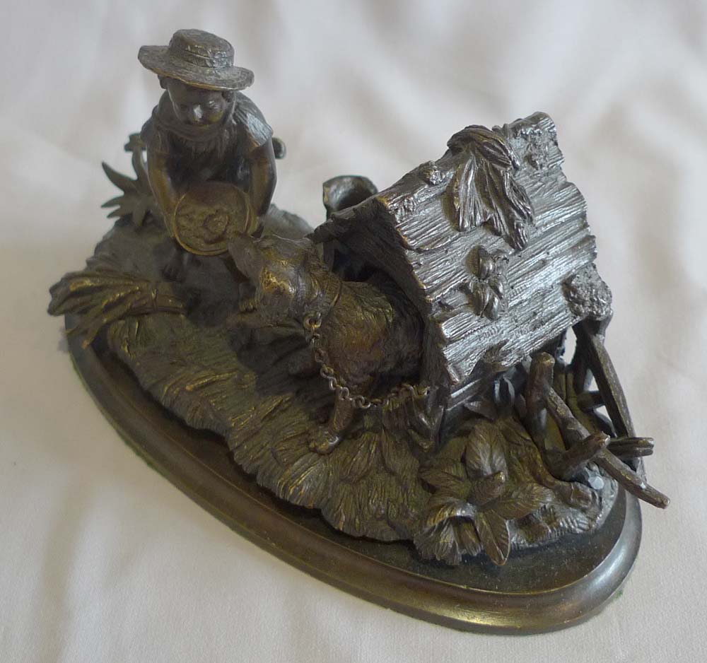 Antique French inkstand and pen holder with dog in kennel and boy.