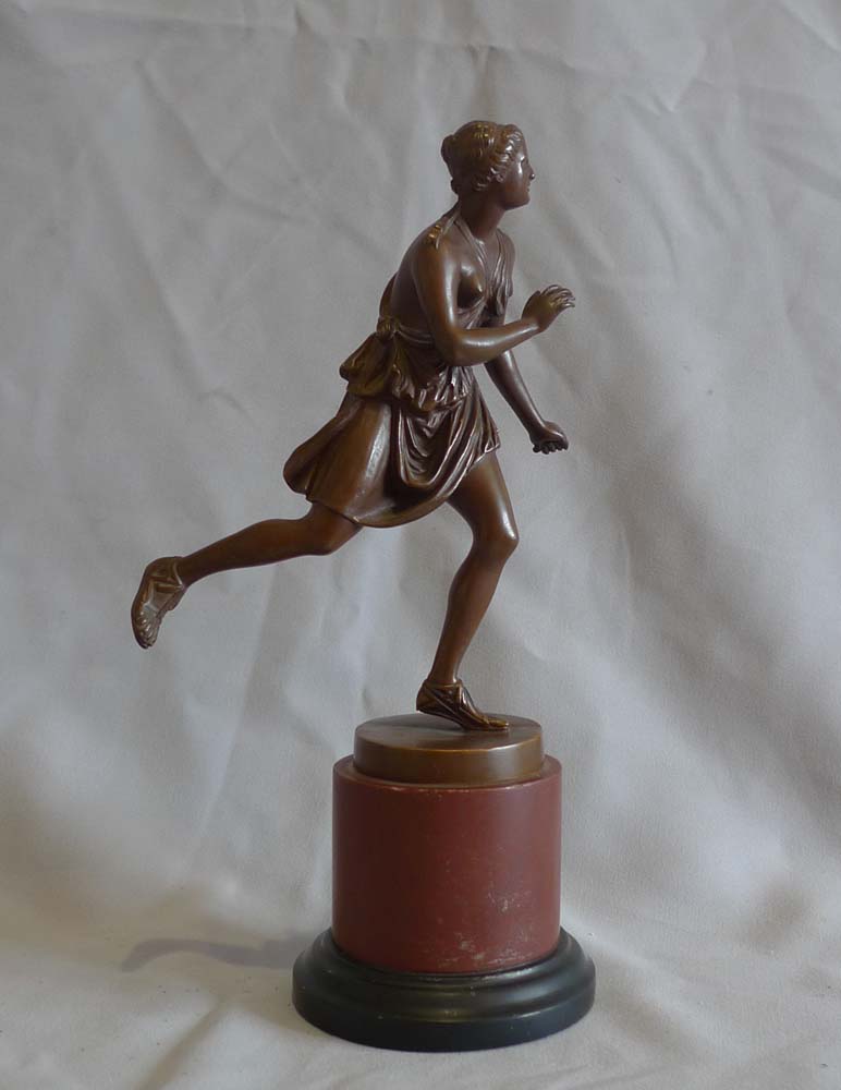 Antique Grand Tour bronze of female athlete after the antique and signed Barbedienne.
