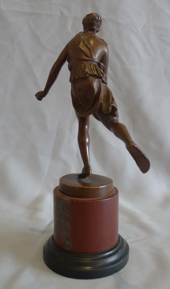Antique Grand Tour bronze of female athlete after the antique and signed Barbedienne.