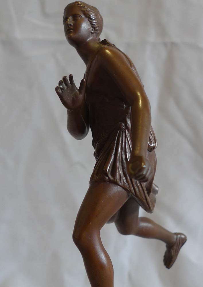 Antique Grand Tour bronze of female athlete after the antique and signed Barbedienne.