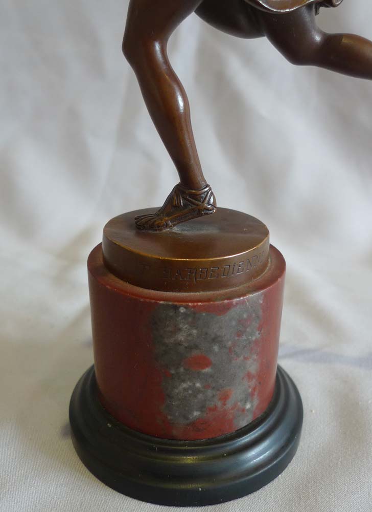 Antique Grand Tour bronze of female athlete after the antique and signed Barbedienne.