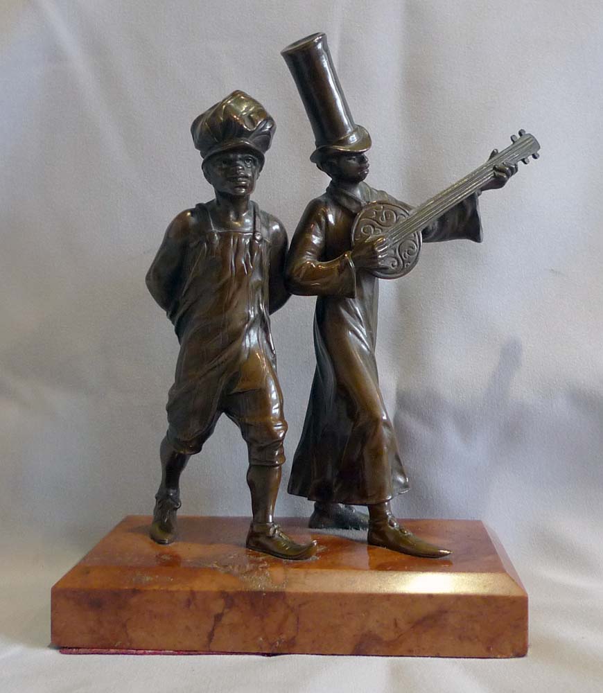 Austrian bronze of two men in New Orleans style dress on marble base.