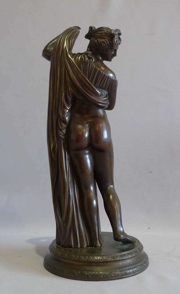 Antique pair of Italian Grand Tour bronzes of Narcissus and the Venus Calipigia.