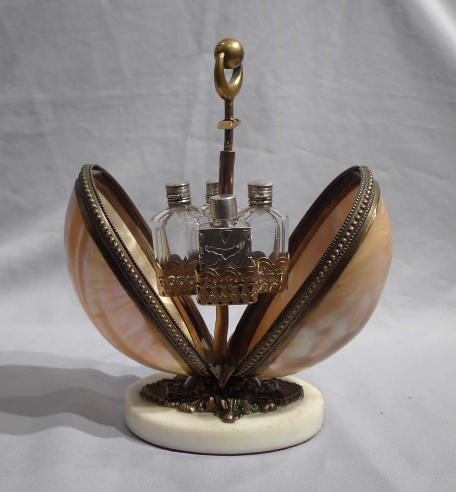 Antique shell and gilt bronze egg shaped mechaical perfume bottle holder