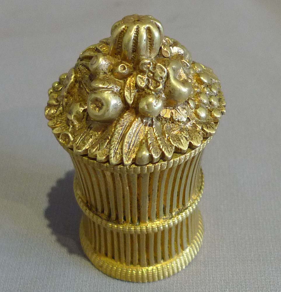 Antique inkwell with hinged lid and modelled as a sheaf of corn.