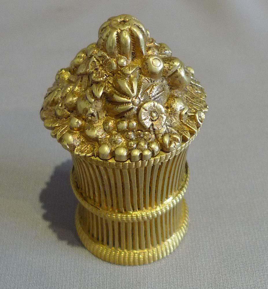 Antique inkwell with hinged lid and modelled as a sheaf of corn.