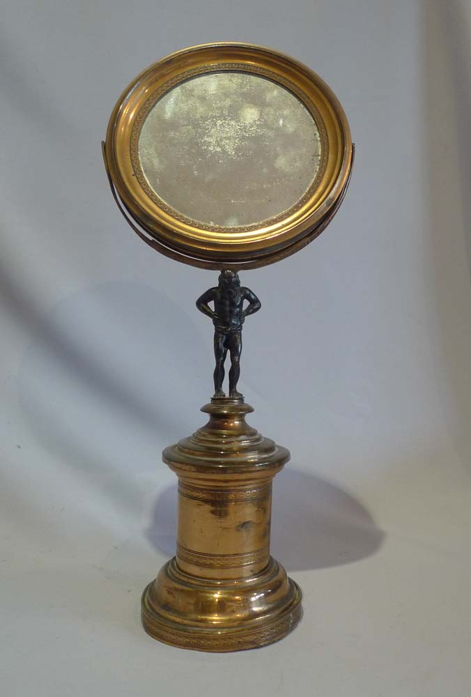 Antique English Regency ormolu swing frame mirror.