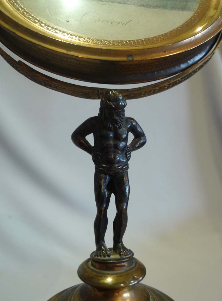Antique English Regency ormolu swing frame mirror.
