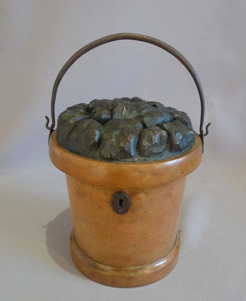 Antique and rare tea caddy in the shape of a coal bucket