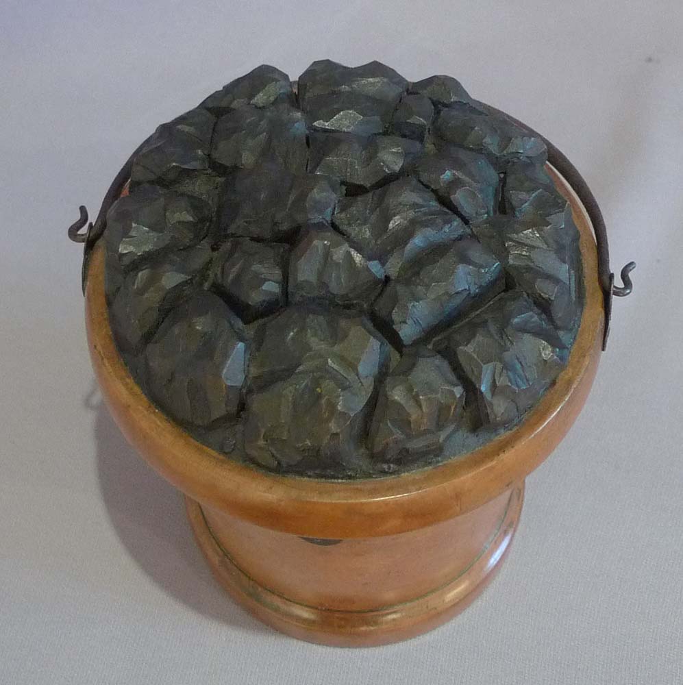 Antique and rare tea caddy in the shape of a coal bucket