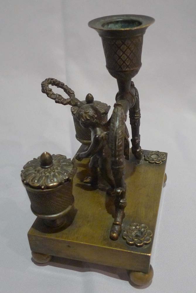 Antique English Regency cherub inkwell with candleholder