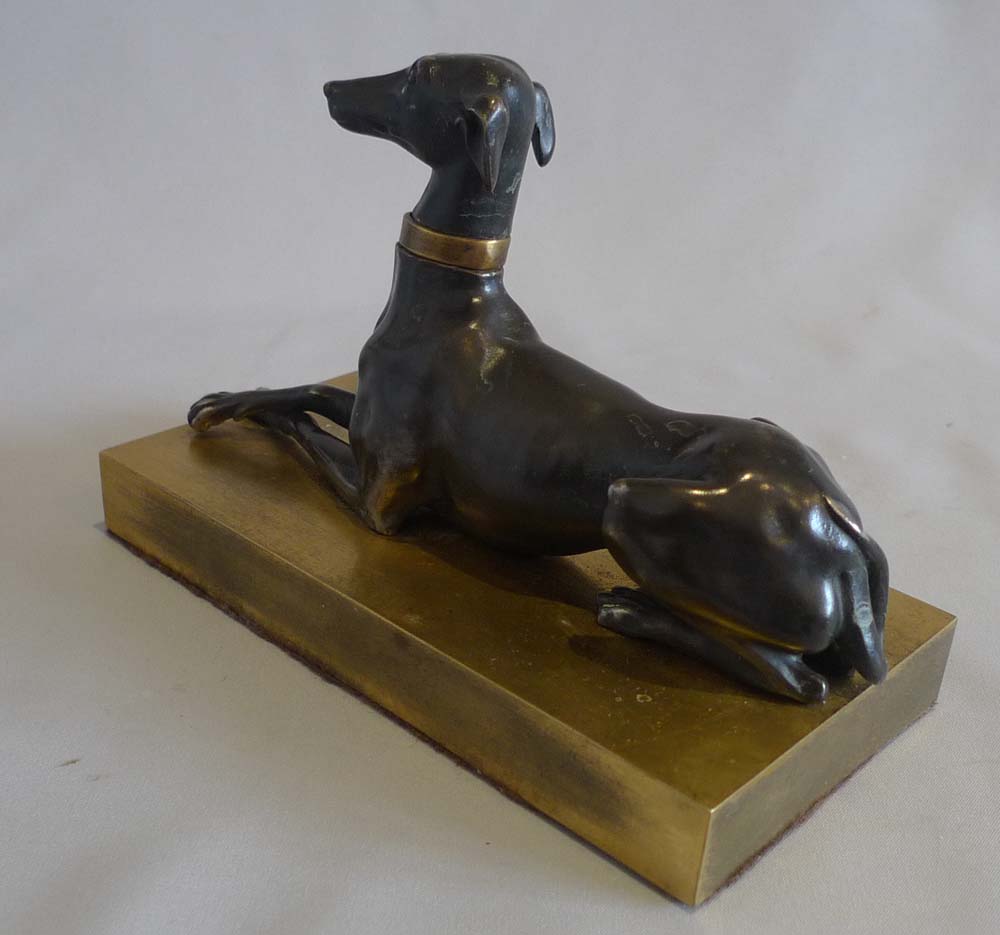 Antique English Regency patinated bronze and ormolu greyhound.