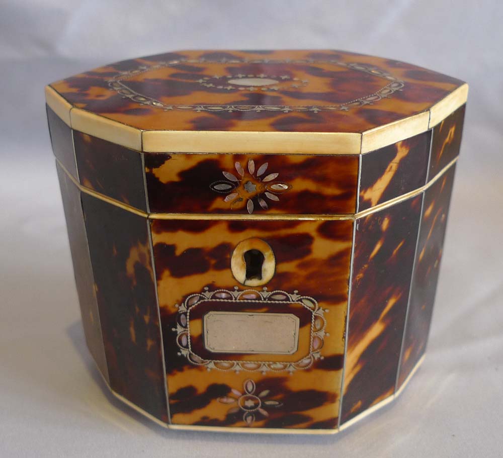 Antique tortoiseshell, ivory and shell tea caddy.