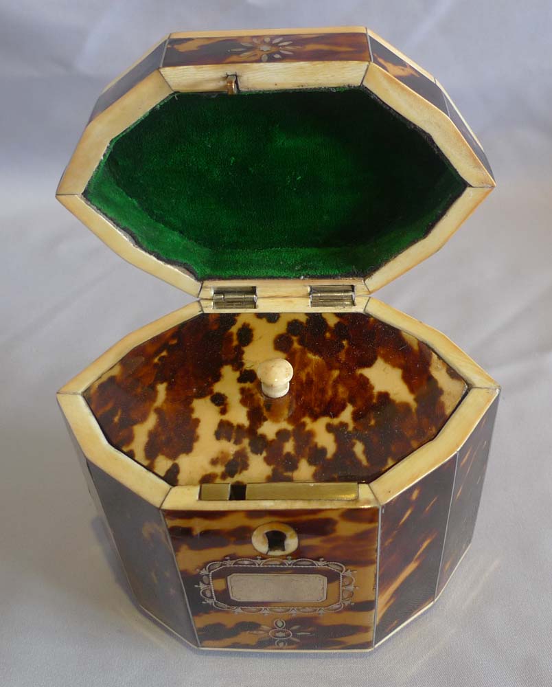 Antique tortoiseshell, ivory and shell tea caddy.