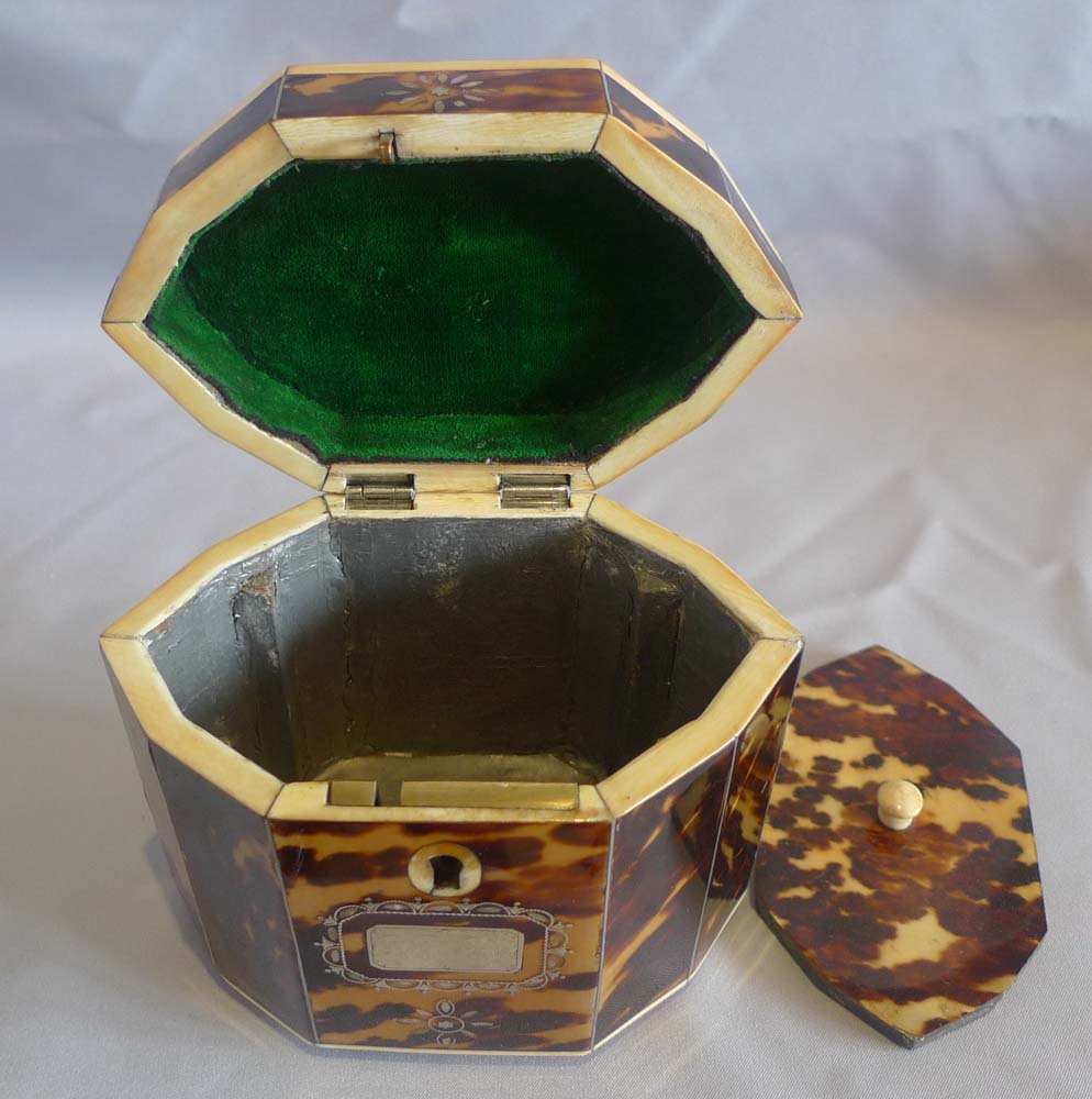 Antique tortoiseshell, ivory and shell tea caddy.