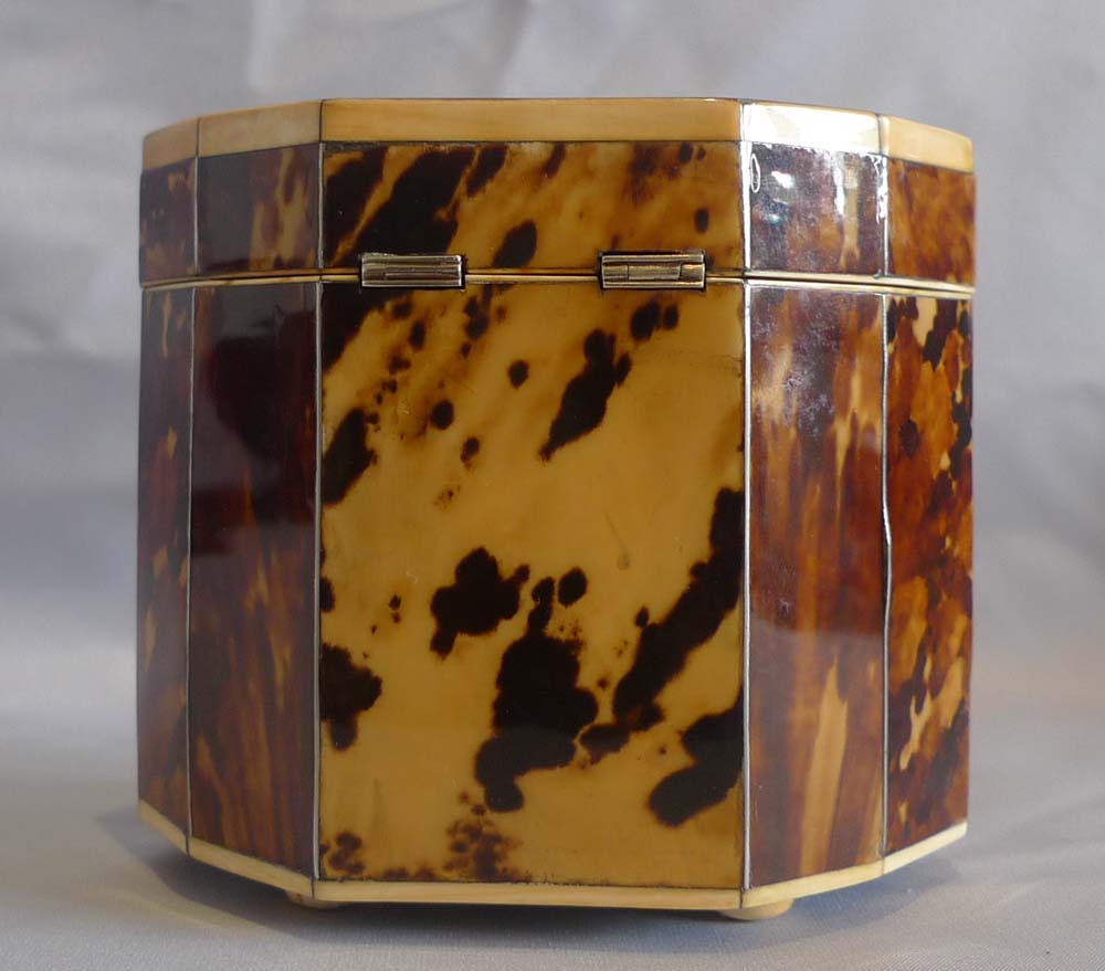 Antique tortoiseshell, ivory and shell tea caddy.