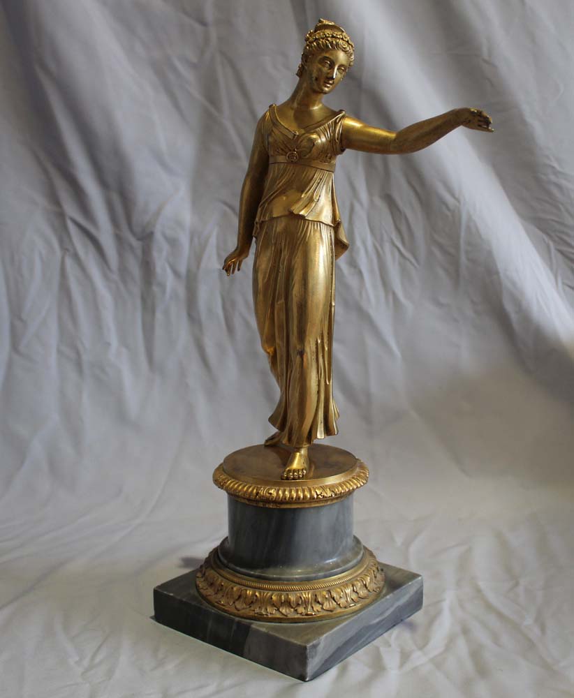 Antique French Louis XVI ormolu statue of a woman on Blue Tarquin ormolu mounted marble base.