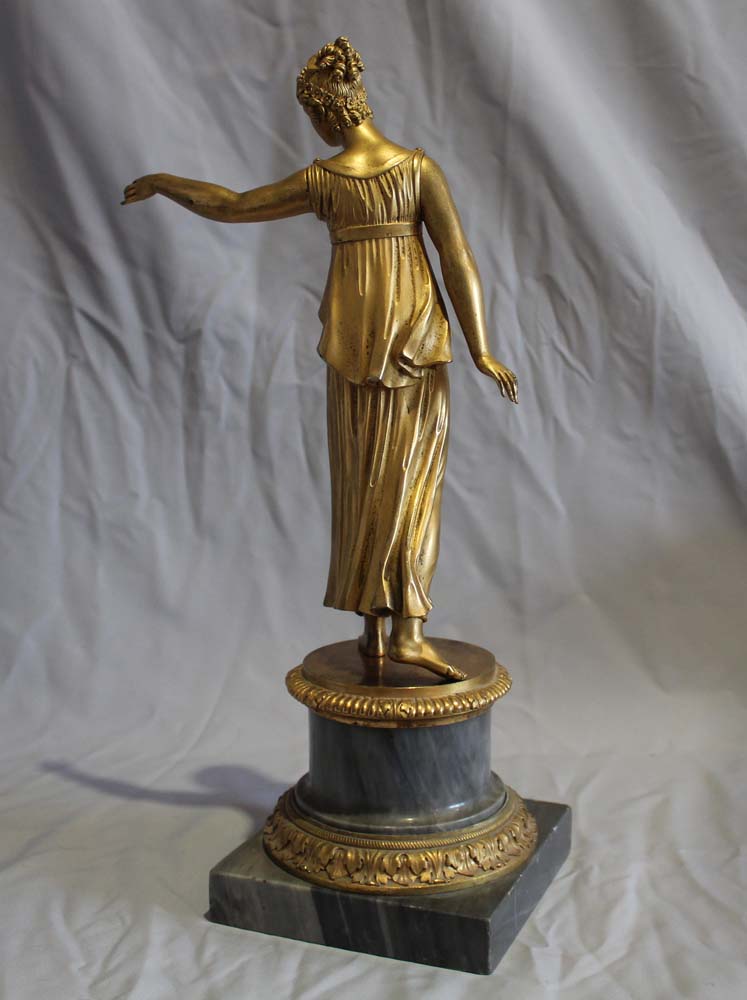 Antique French Louis XVI ormolu statue of a woman on Blue Tarquin ormolu mounted marble base.